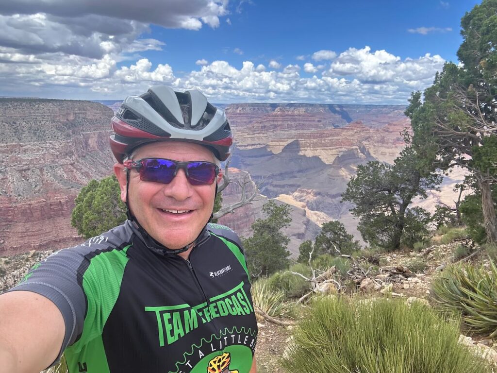 David from The FredCast cycling at the Grand Canyon